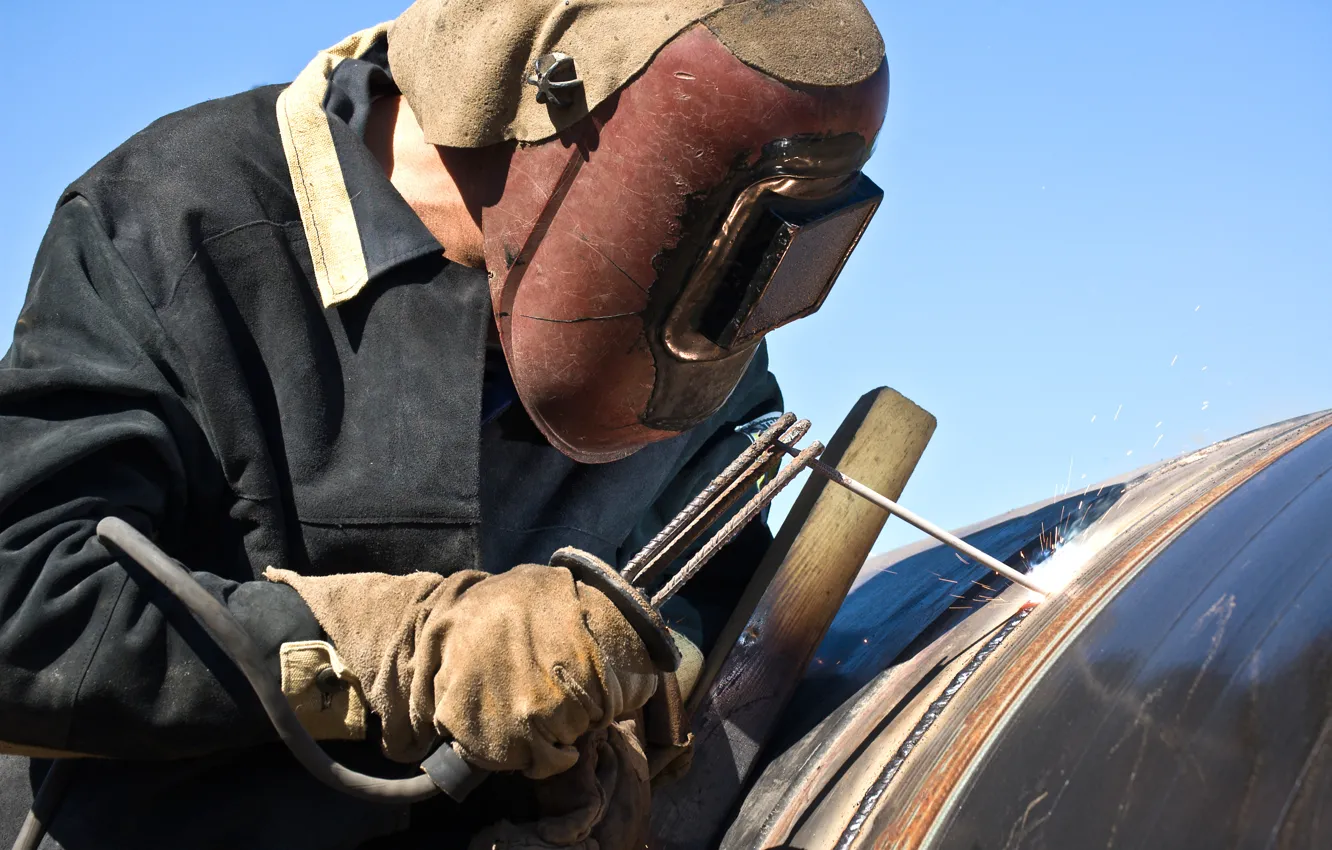 Photo wallpaper welder, personal protective equipment, laborer, worker