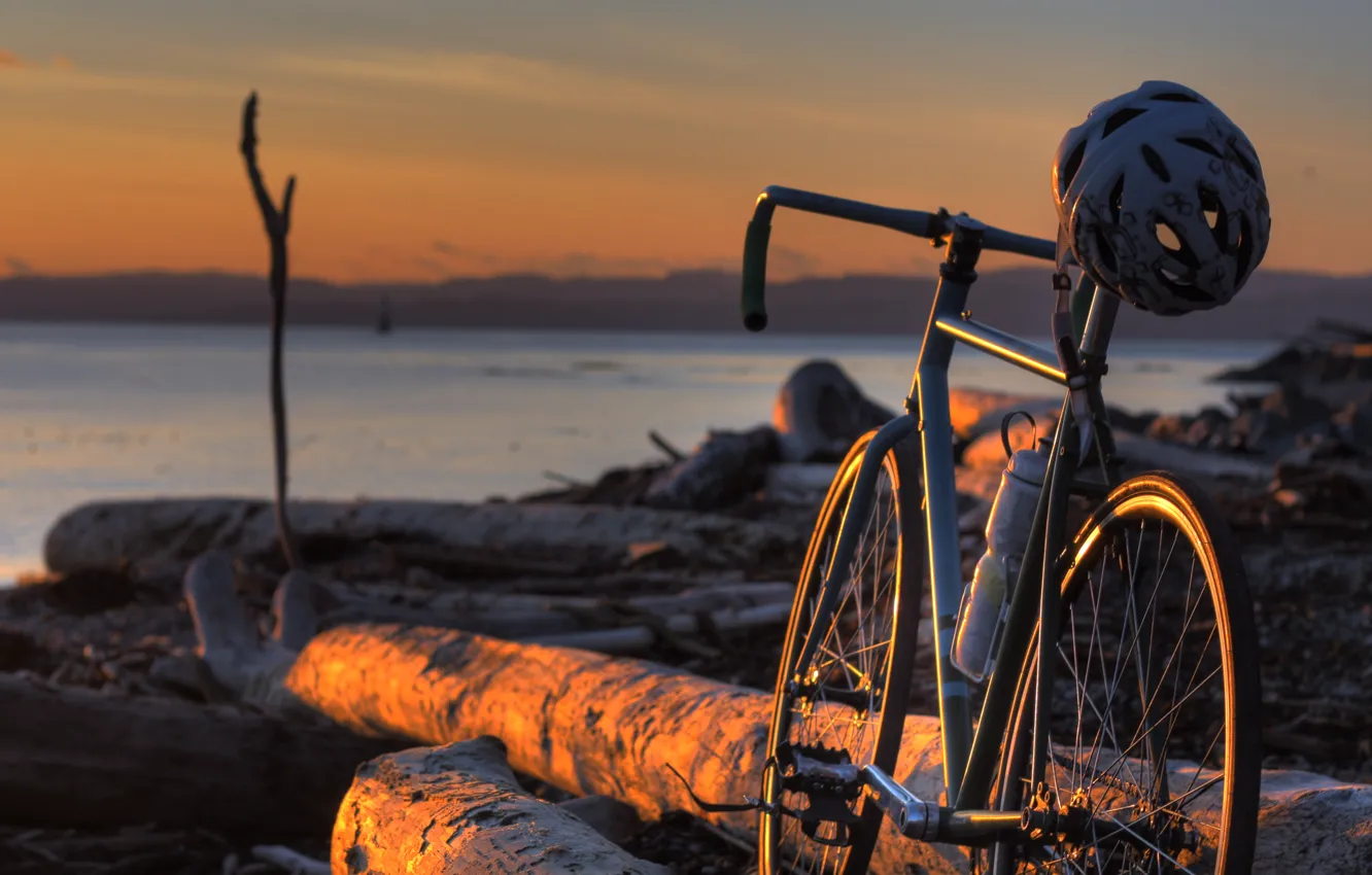 Photo wallpaper bike, shore, logs, helmet