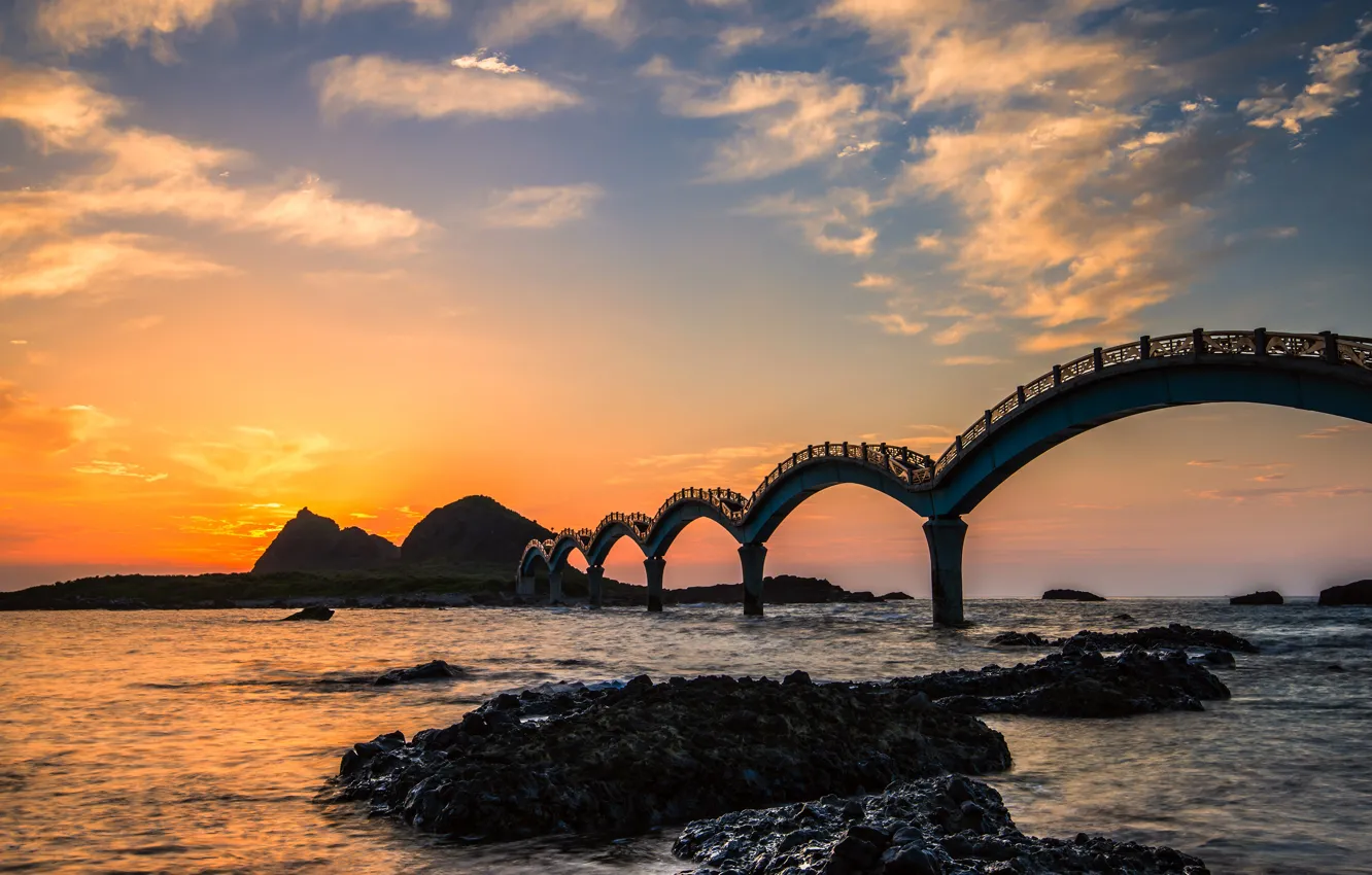 Photo wallpaper sea, the sky, clouds, sunset, bridge, stones, rocks, dawn