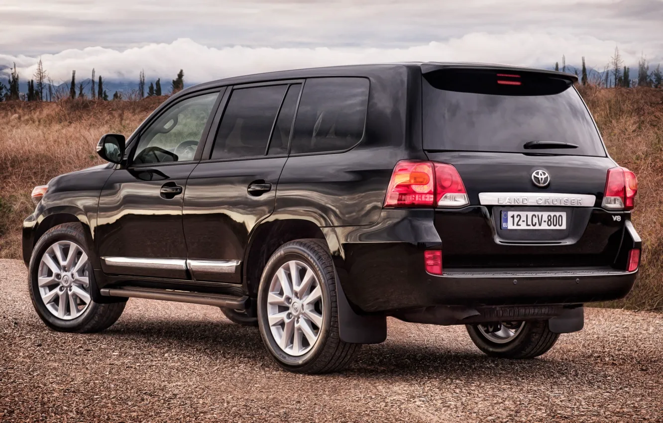 Photo wallpaper the sky, black, jeep, SUV, rear view, the bushes, toyota, Toyota