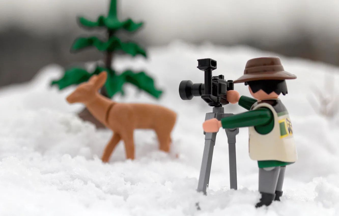 Photo wallpaper macro, snow, toy, spruce, deer, photographer, figures, bokeh