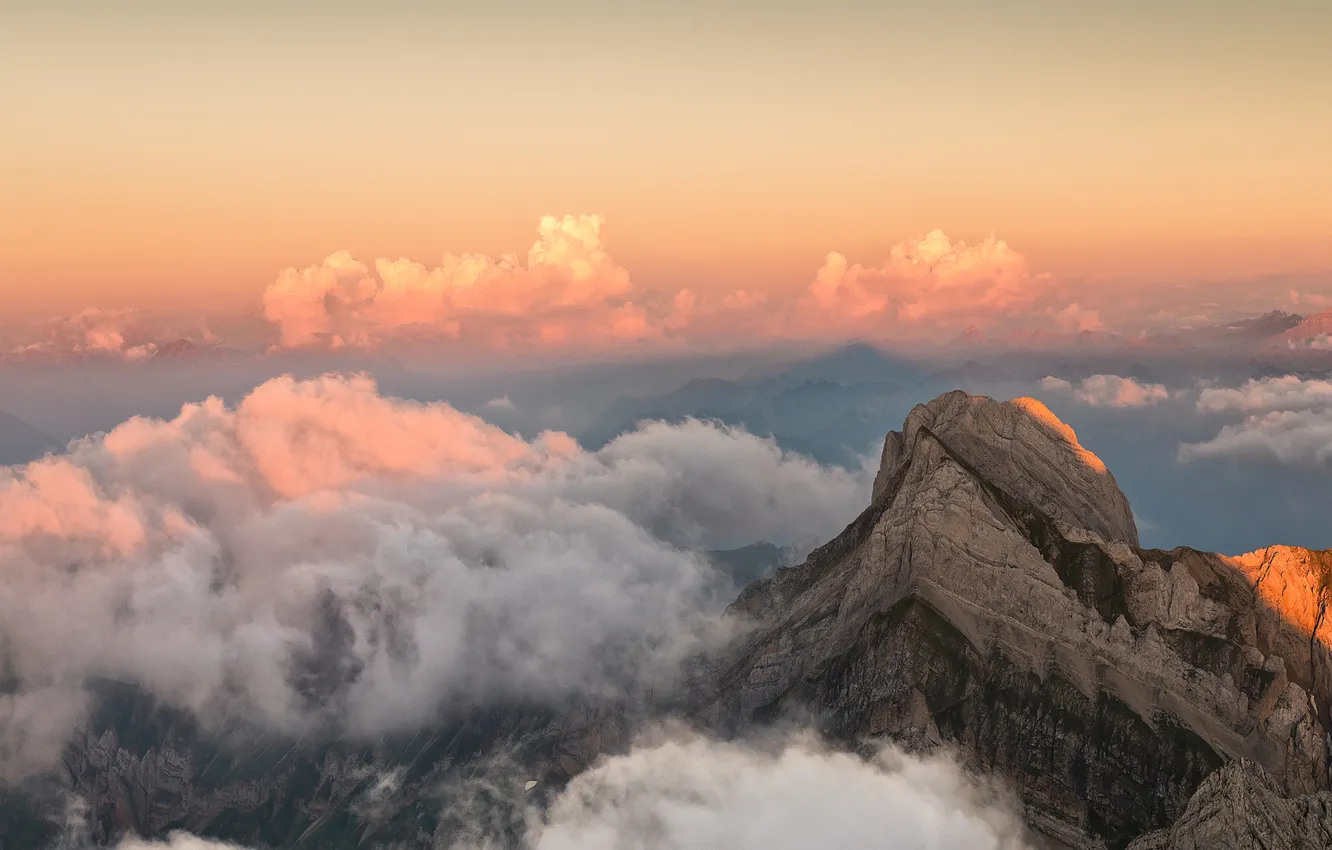 Photo wallpaper the sky, clouds, light, mountains, fog, rocks, tops, height