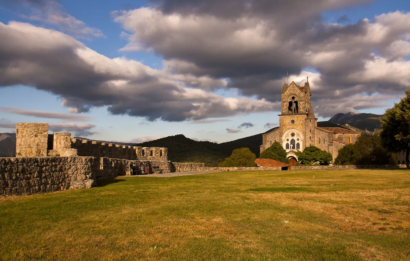 Photo wallpaper grass, clouds, hills, ruin, church