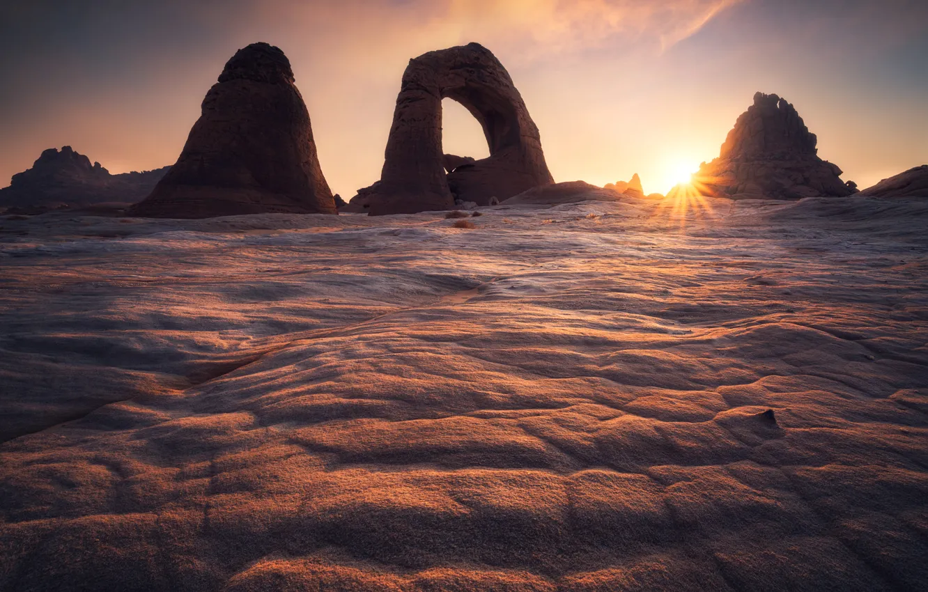 Photo wallpaper the sun, rays, sunset, stones, rocks, desert, arch