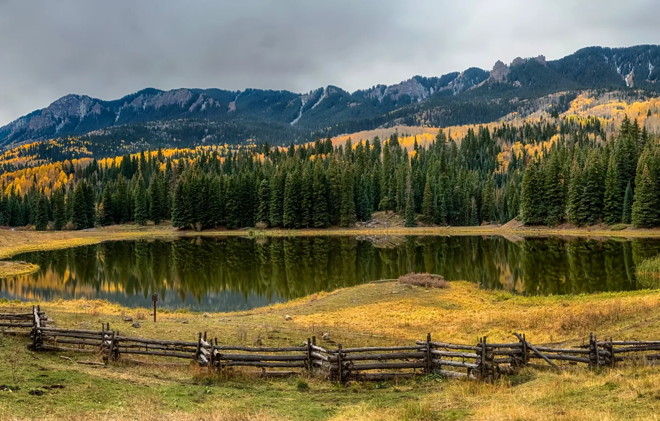 Photo wallpaper autumn, forest, grass, trees, mountains, lake, rocks, the fence