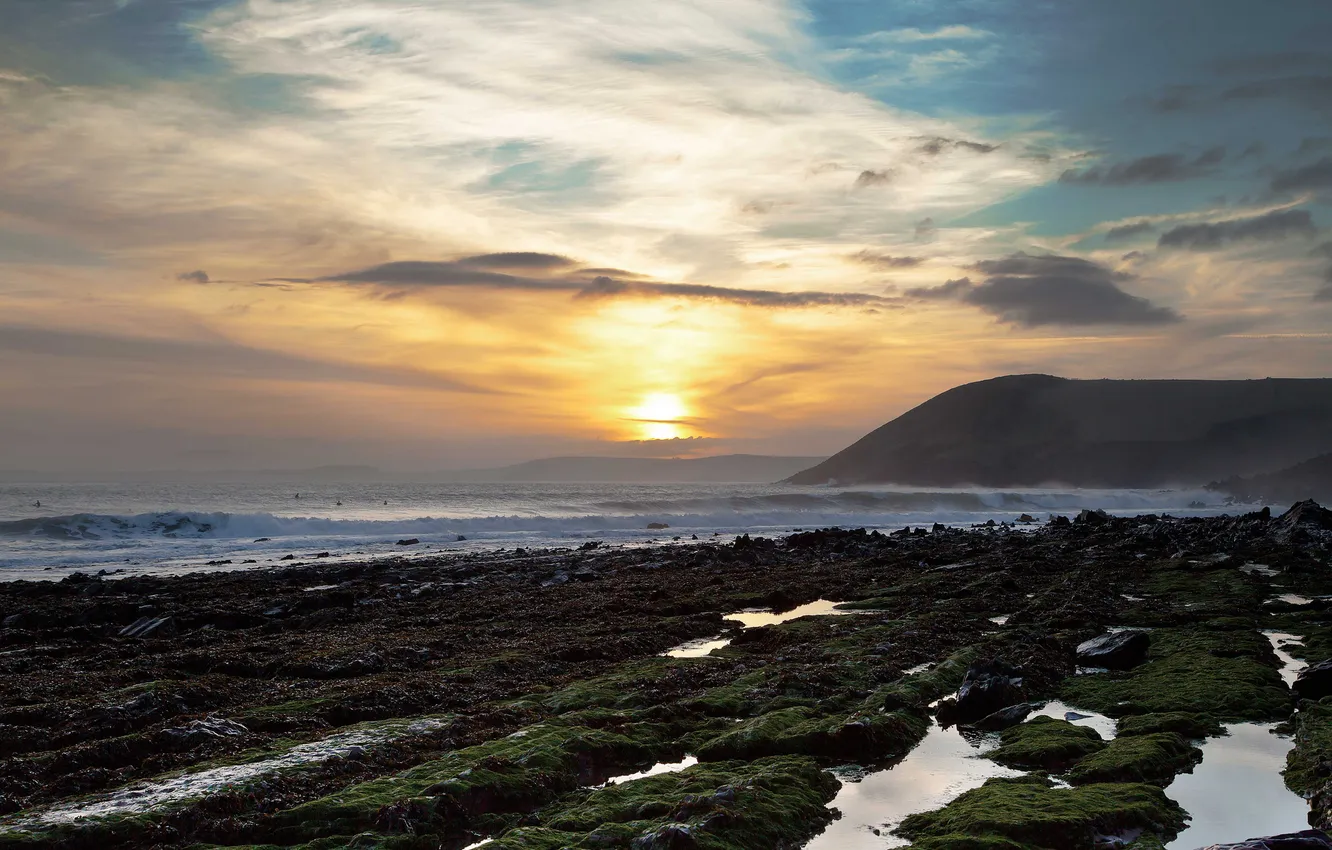Photo wallpaper sea, wave, the sun, clouds, sunset, shore, rocky