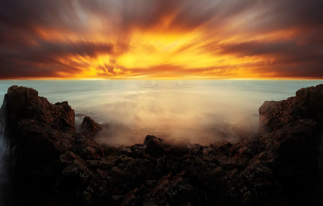 Photo wallpaper sea, clouds, sunset, stones, rocks, the evening, horizon, glow