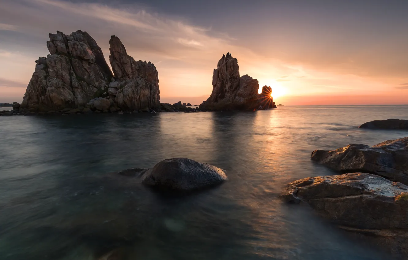 Photo wallpaper sea, the sky, the sun, clouds, light, sunset, stones, rocks
