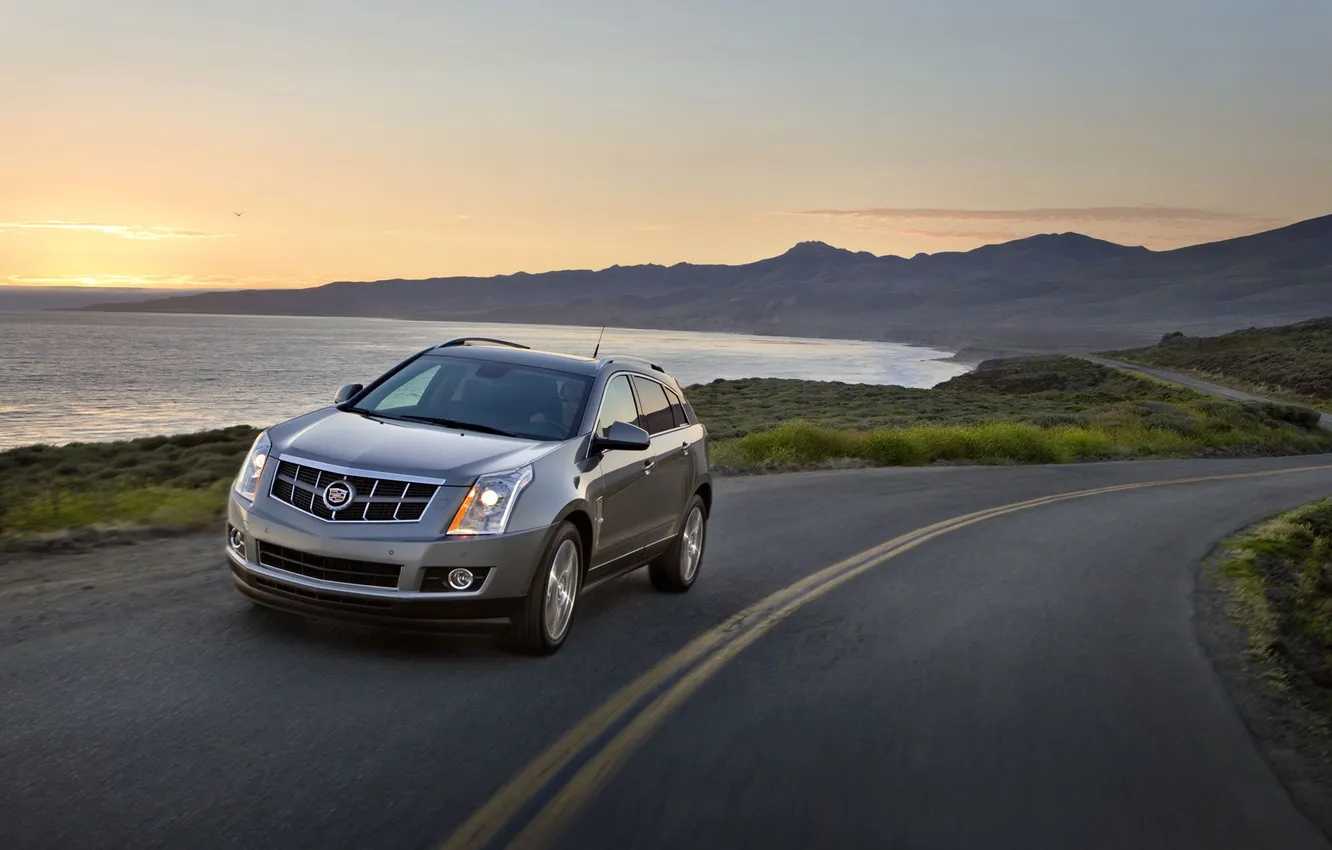 Photo wallpaper road, sea, auto, the sky, sunset, Cadillac, in motion, the front