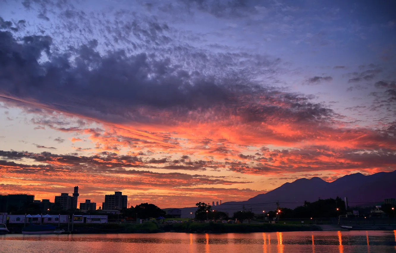 Photo wallpaper the sky, clouds, sunset, mountains, city, the city, river, building