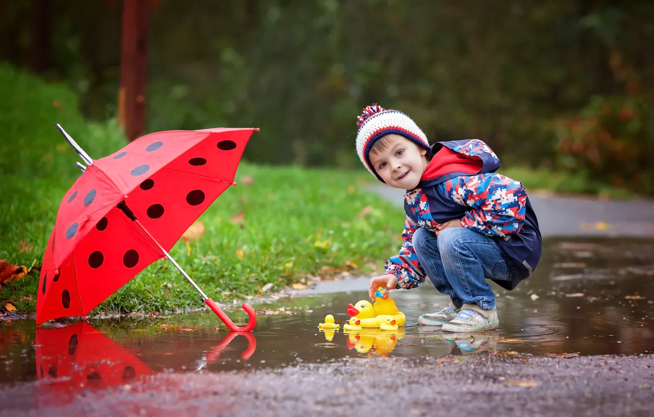 Photo wallpaper autumn, rain, street, toy, child, umbrella, boy, jacket