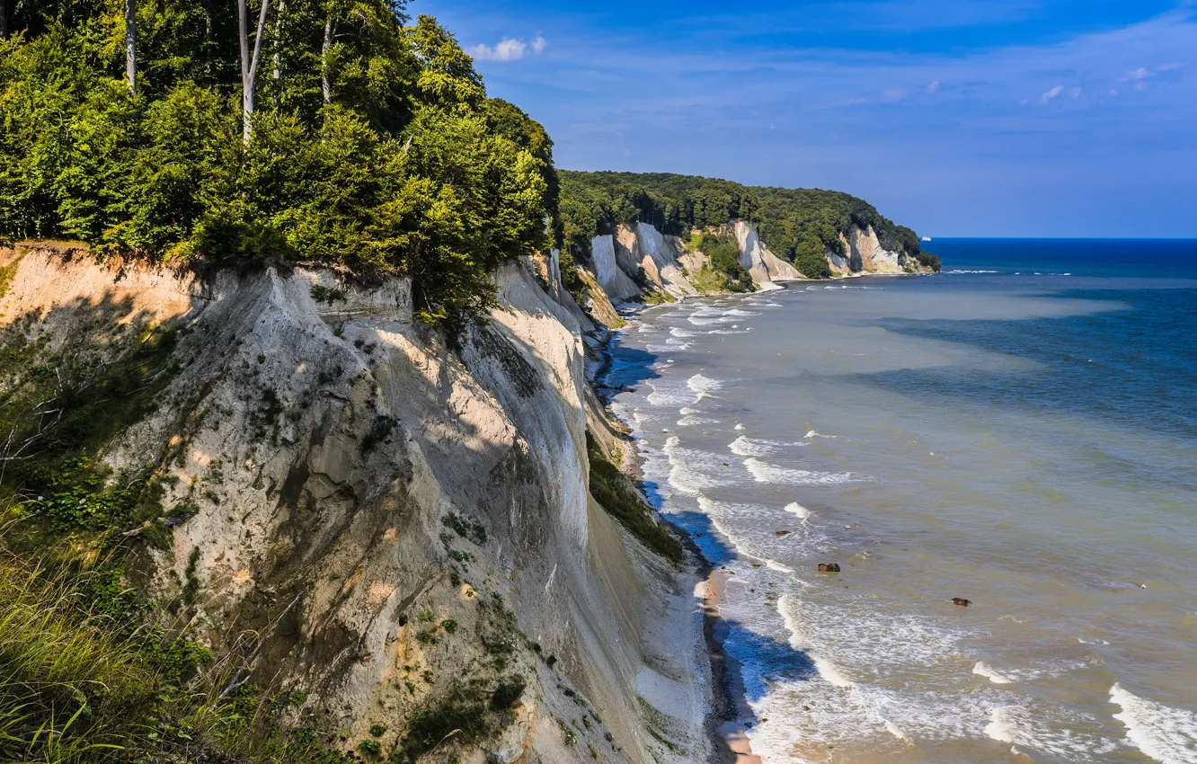 Photo wallpaper sea, the sky, the sun, trees, rocks, coast, Germany, horizon