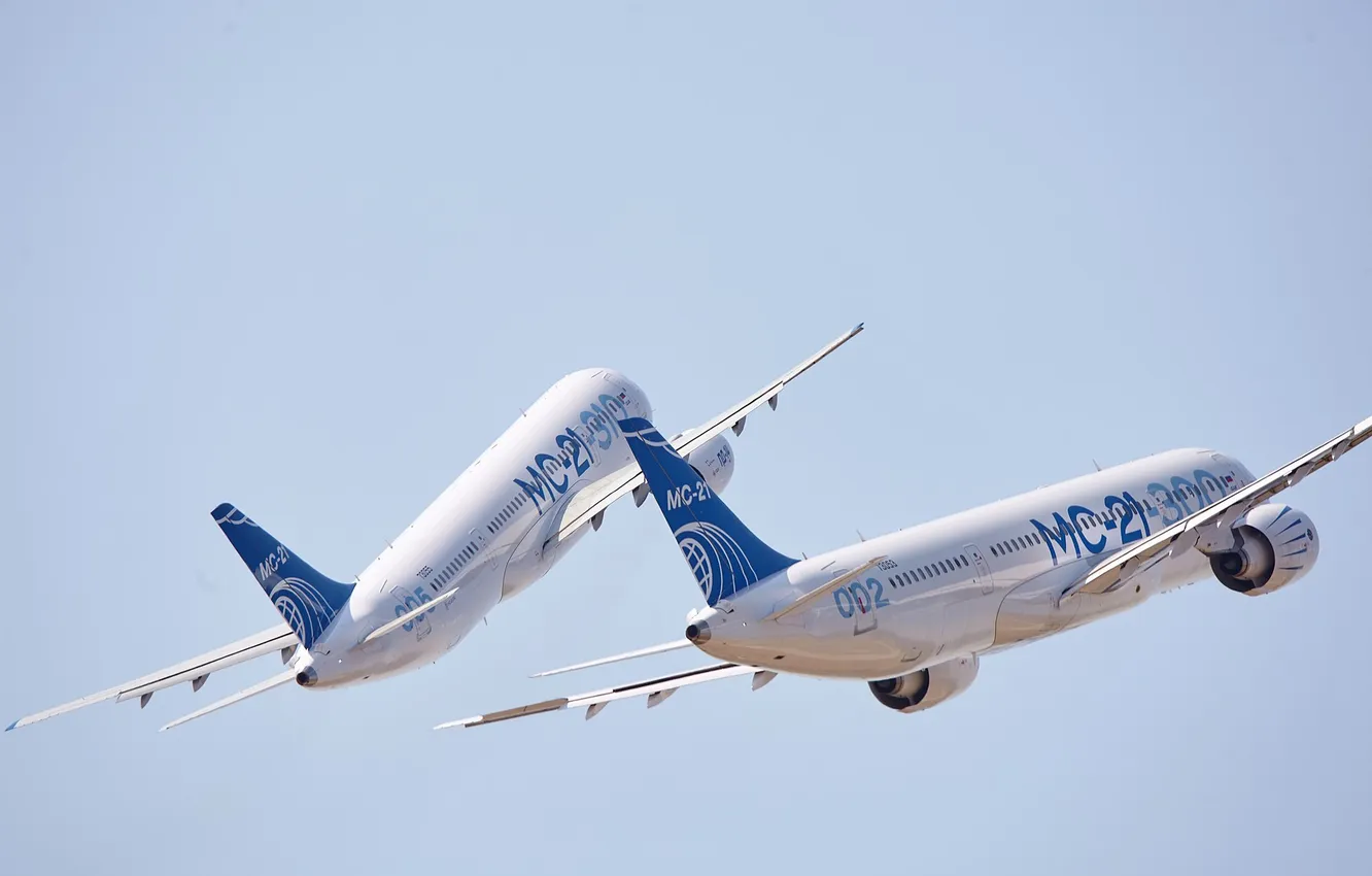Photo wallpaper the sky, two aircraft, A passenger plane