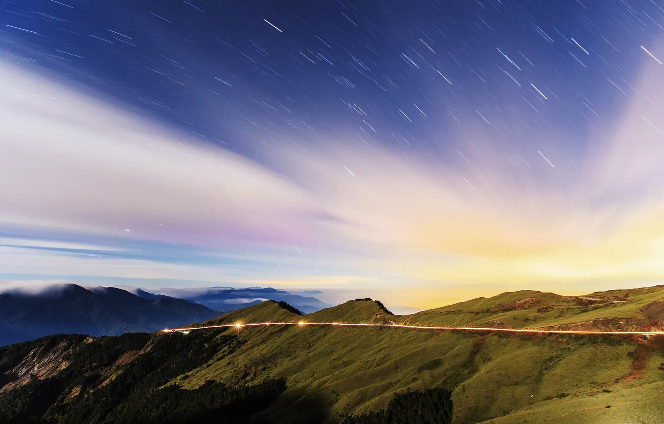 Photo wallpaper road, stars, lights, strip, hills, shooting, starry sky