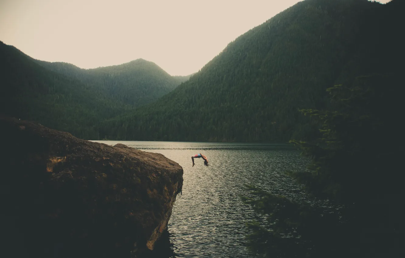 Photo wallpaper mountains, rock, lake, jump, male