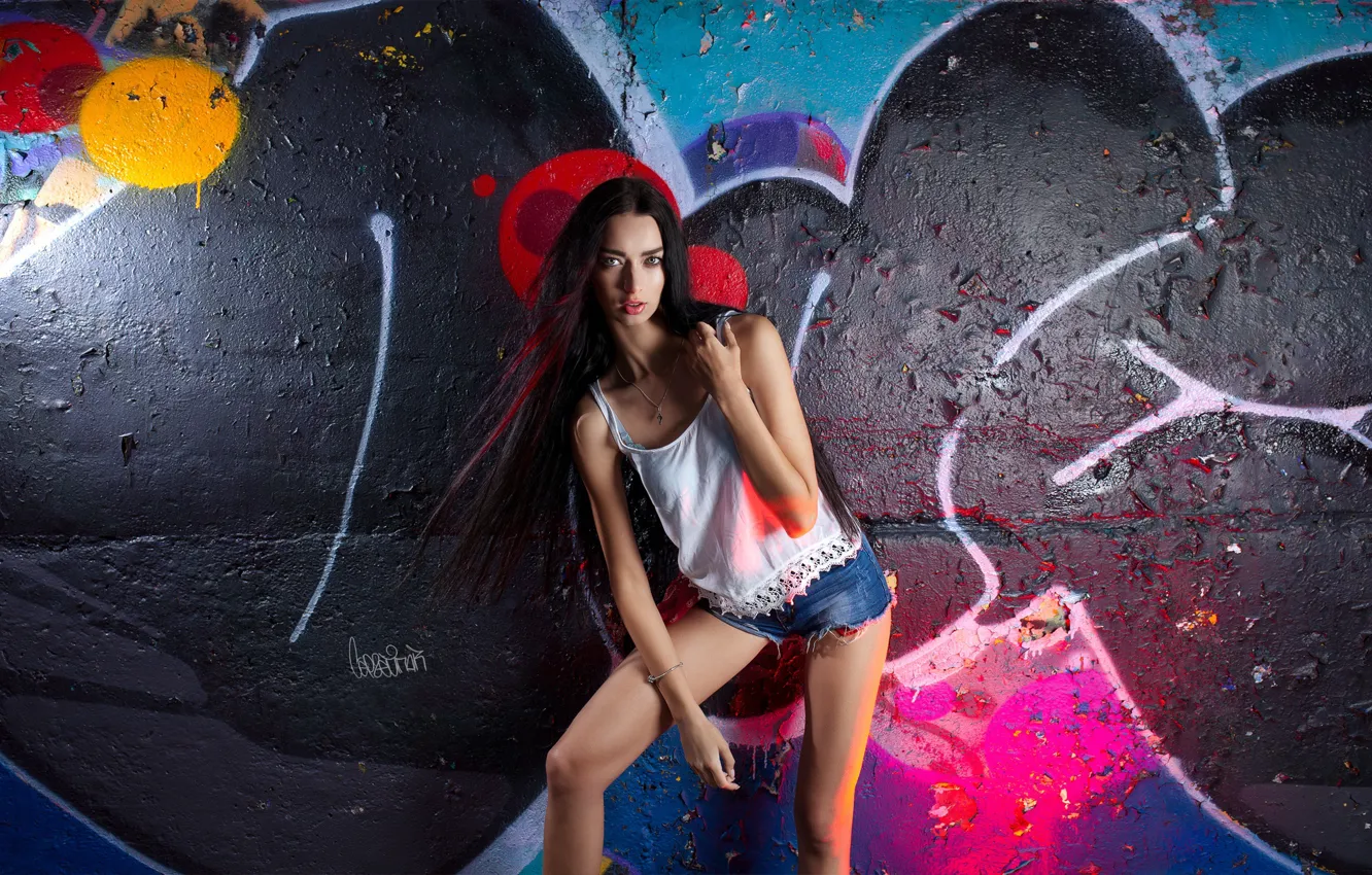 Photo wallpaper girl, pose, wall, graffiti, shorts, long hair, Sergey Pak