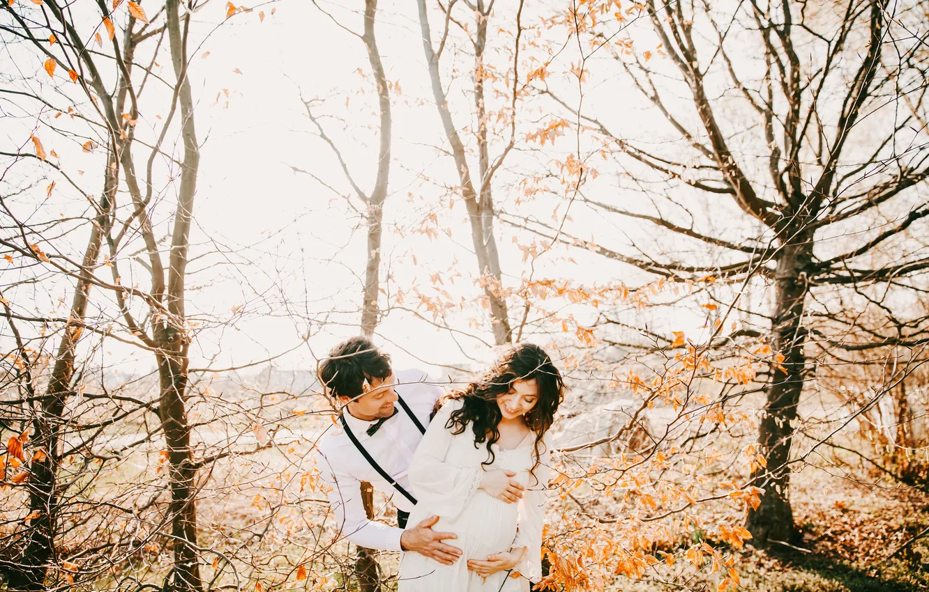 Photo wallpaper forest, girl, branches, guy, lovers, pregnant