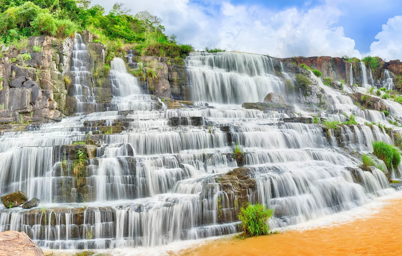 Photo wallpaper greens, the sky, grass, the sun, clouds, stones, rocks, waterfall