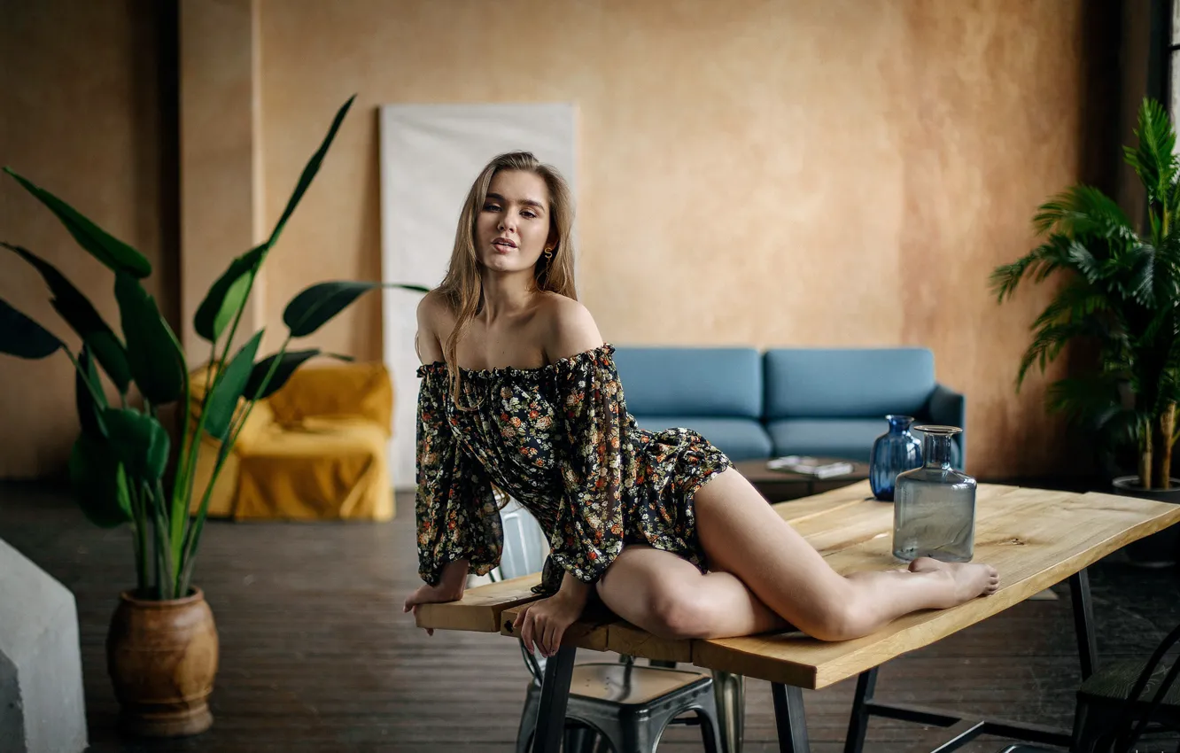 Photo wallpaper dress, barefoot, model, women, brunette, table, plants, couch