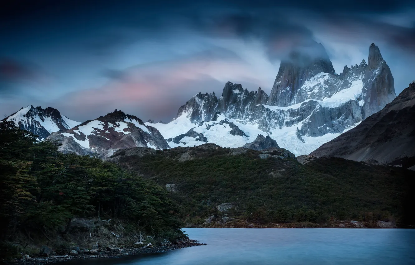Photo wallpaper forest, the sky, clouds, snow, mountains, overcast, rocks, shore