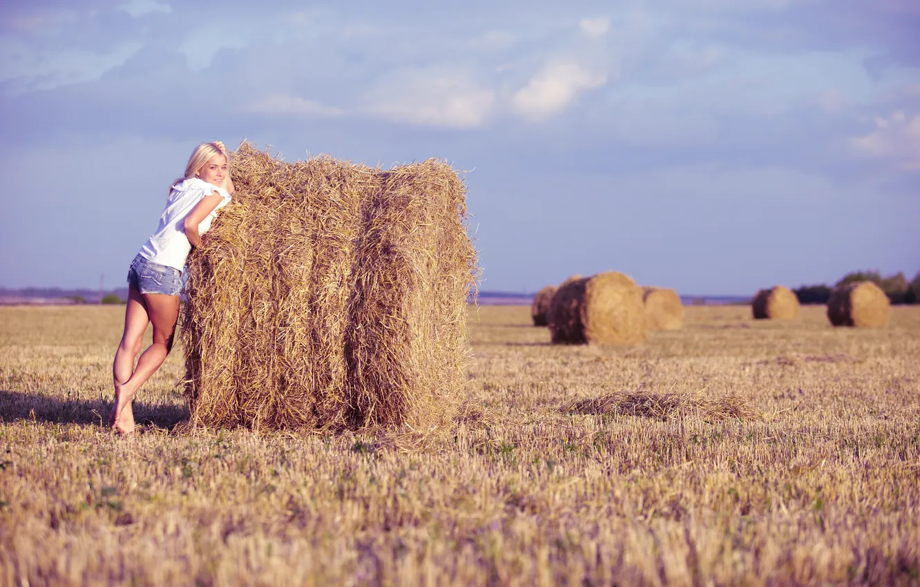 Photo wallpaper field, the sky, girl, shorts, blonde, hay, bales, legs