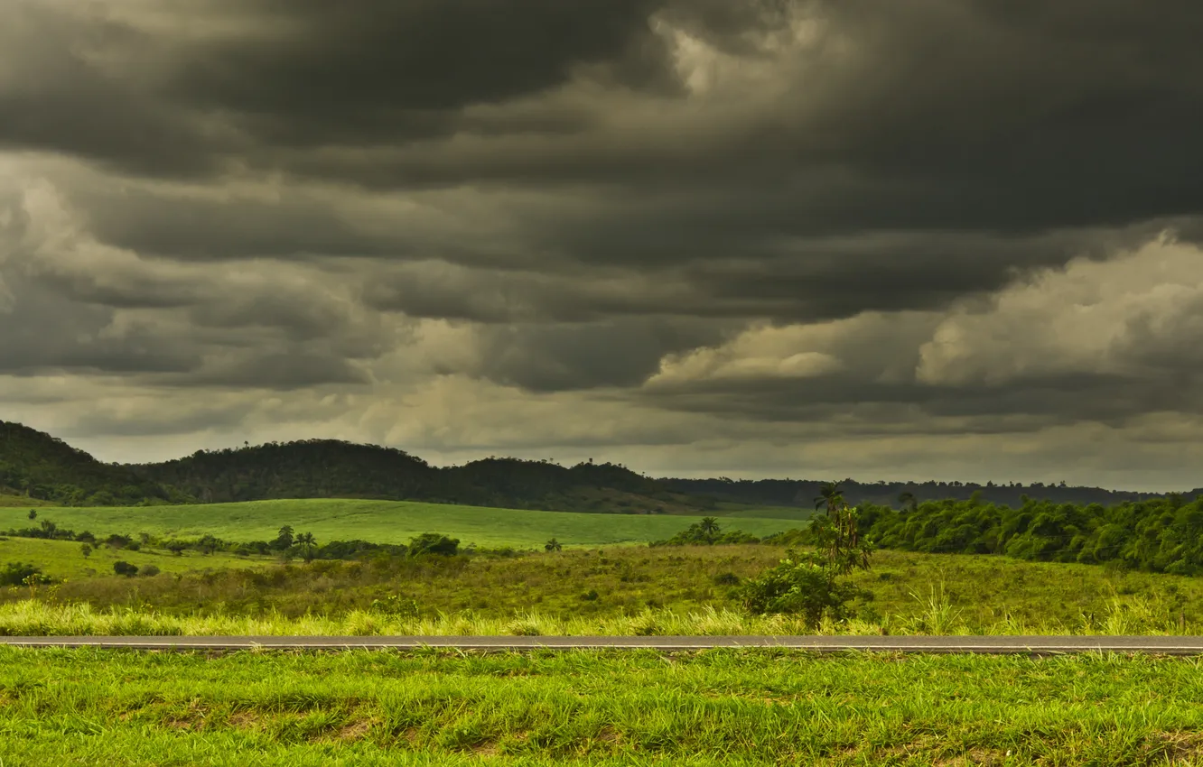 Photo wallpaper road, the storm, field, hills, gray clouds