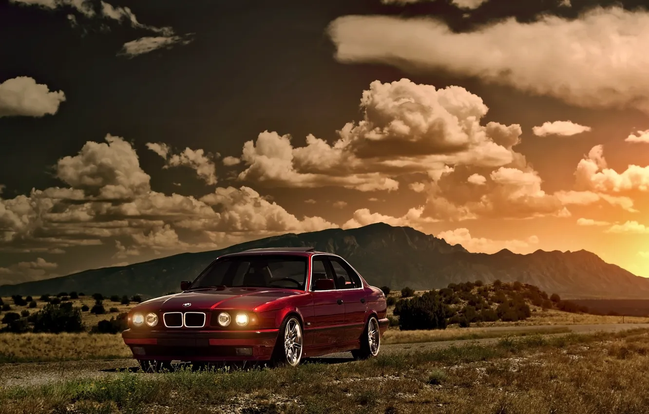 Photo wallpaper the sky, the sun, clouds, sunset, mountains, BMW, BMW, red
