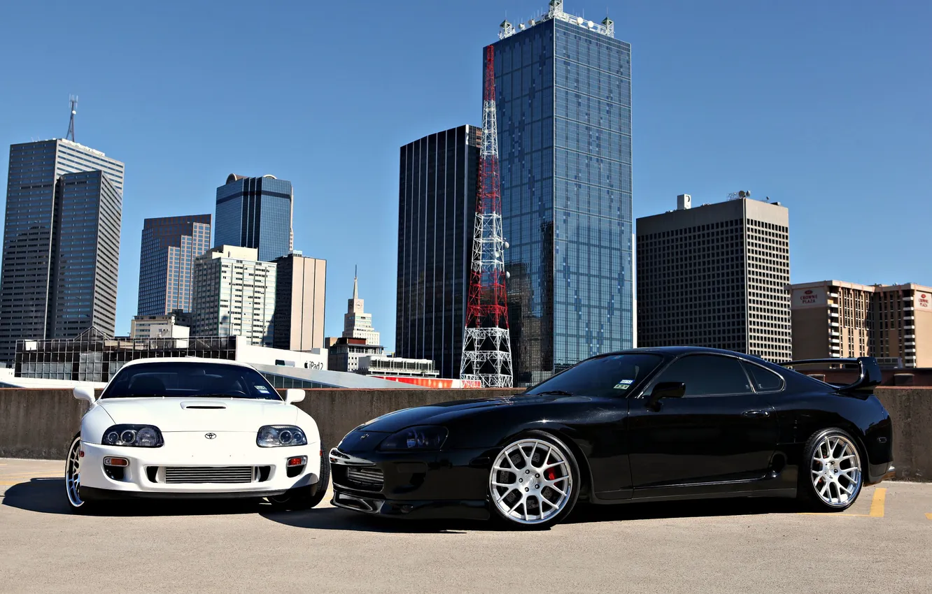 Photo wallpaper white, black, skyscrapers, Parking, white, Toyota, black, megapolis