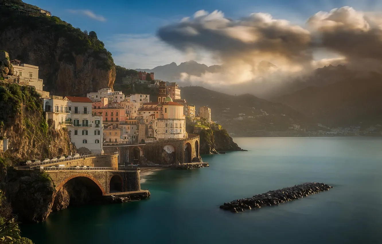 Photo wallpaper sea, clouds, mountains, the city, rocks, coast, home, morning