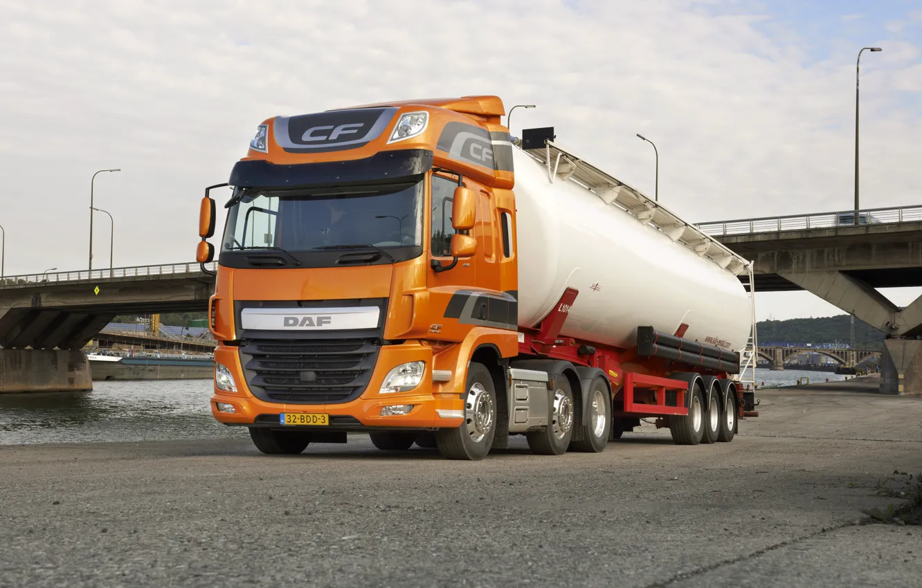 Photo wallpaper orange, bridge, river, Parking, DAF, tank, tractor, DAF