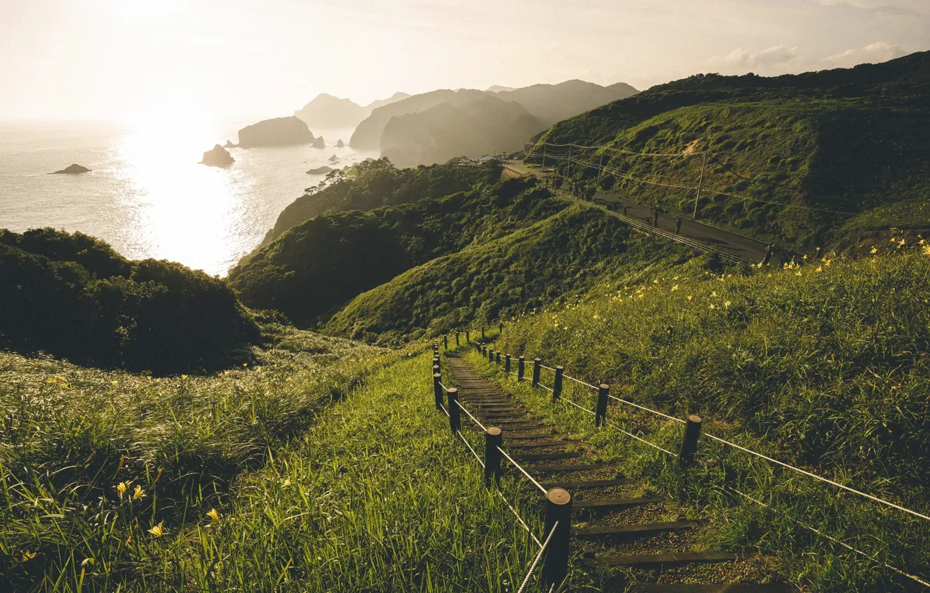 Photo wallpaper sea, grass, the sun, mountains, hills, ladder, steps