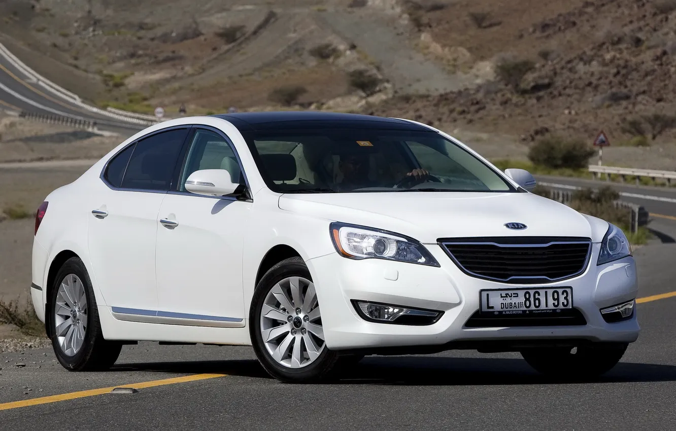 Photo wallpaper white, asphalt, hills, sign, the fence, white, Kia, Kia