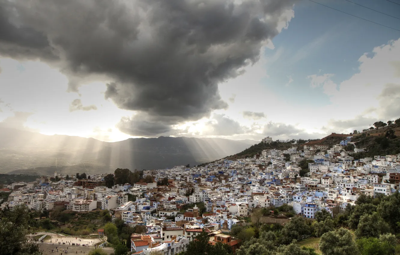 Photo wallpaper the sky, clouds, trees, mountains, home, panorama, the rays of the sun, Morocco