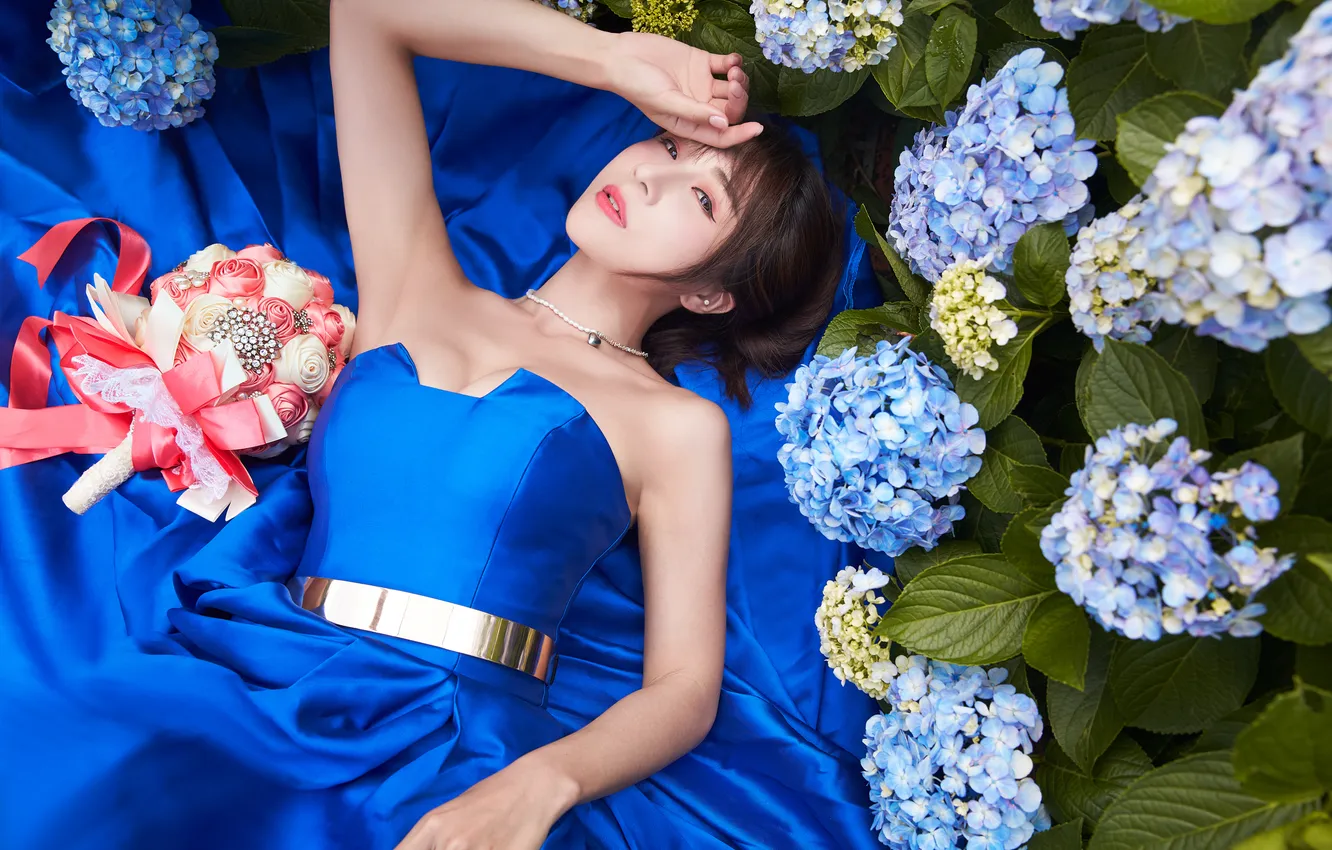 Photo wallpaper girl, flowers, pose, bouquet, hands, dress, brunette, neckline