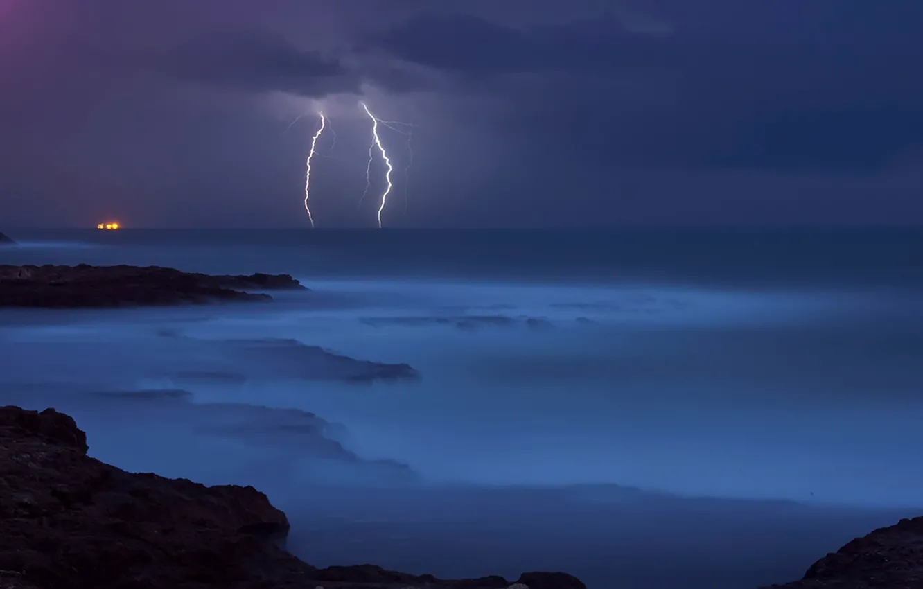 Photo wallpaper sea, the storm, water, blue, stones, element, shore, lightning