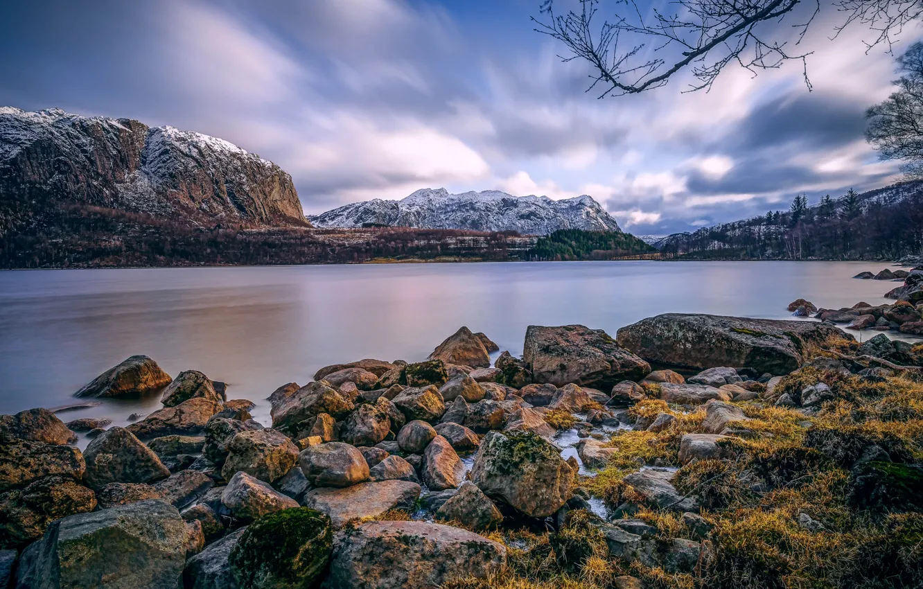 Photo wallpaper grass, mountains, river, stones, shore, vegetation, snowy peaks, timelapse