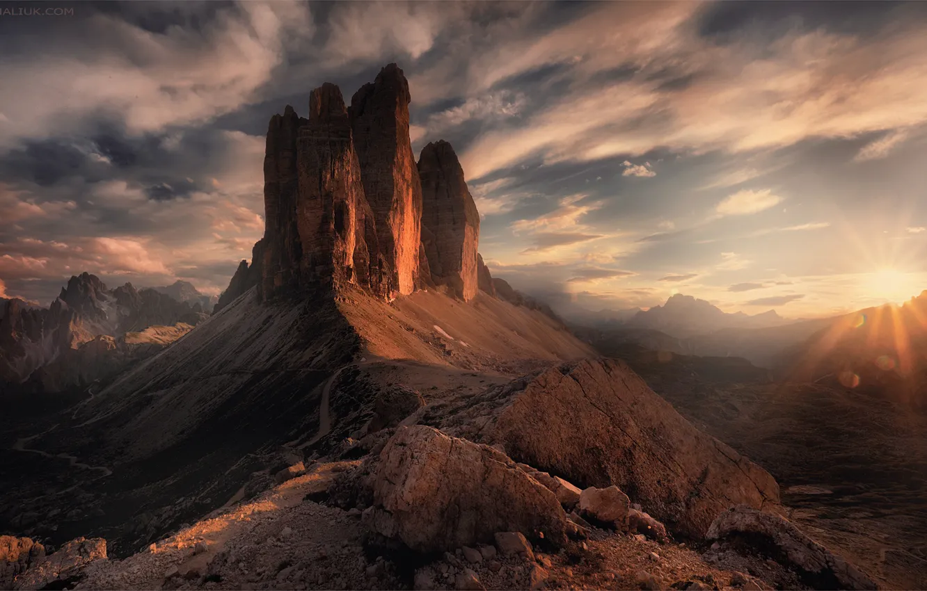 Photo wallpaper the sun, clouds, rays, sunset, mountains, stones