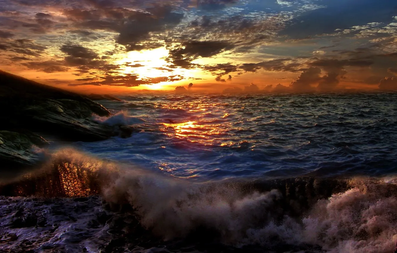 Photo wallpaper sea, wave, the sun, clouds, rays, storm, droplets, rocks