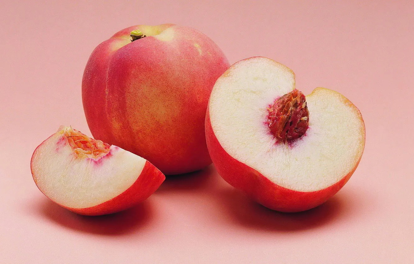 Photo wallpaper peaches, bone, slices, a, cut, pink background