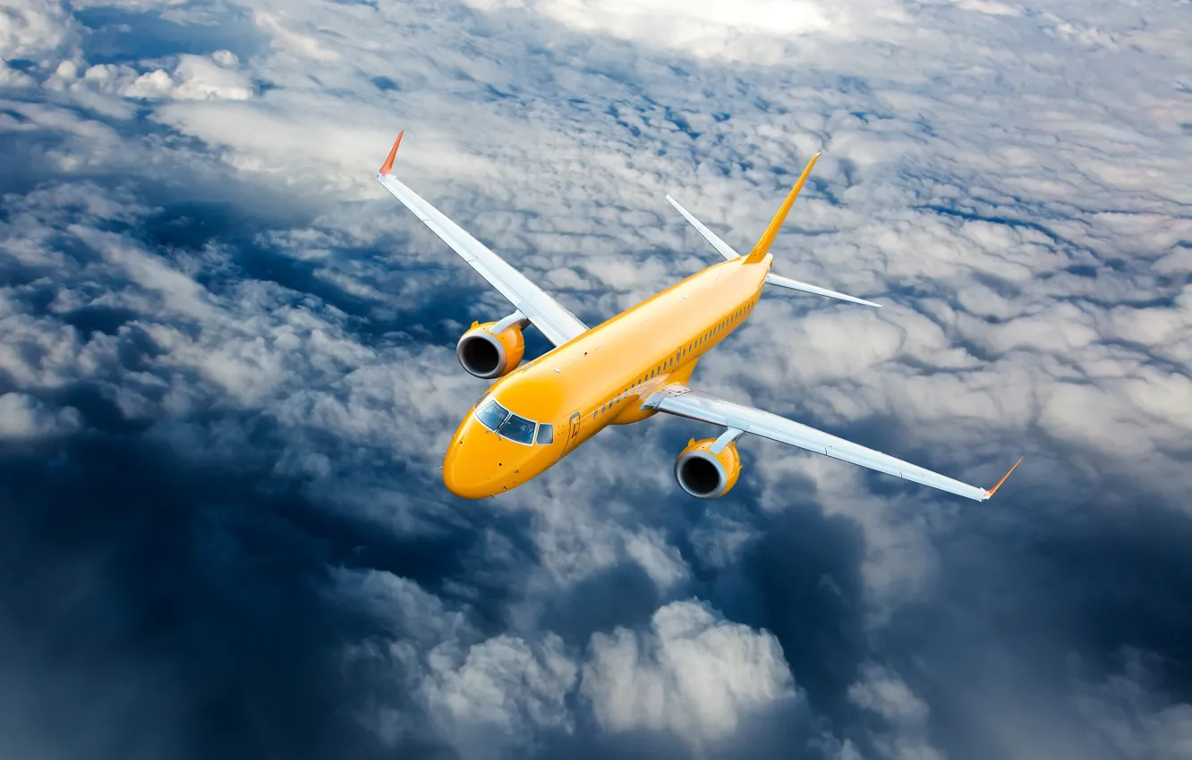 Photo wallpaper clouds, yellow, height, the plane, flies, in the sky, passenger