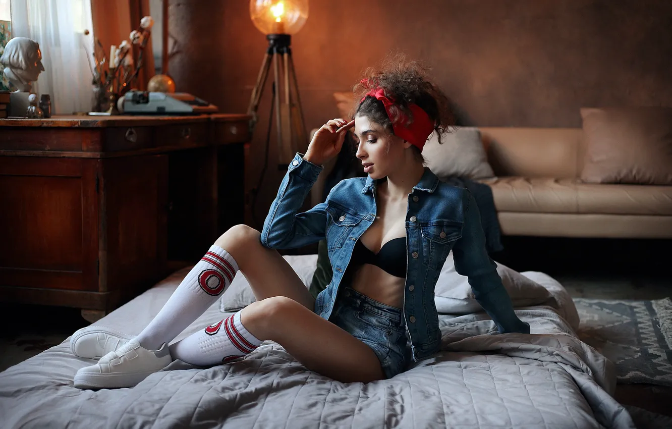 Photo wallpaper girl, pose, shorts, bed, legs, knee, bra, curls