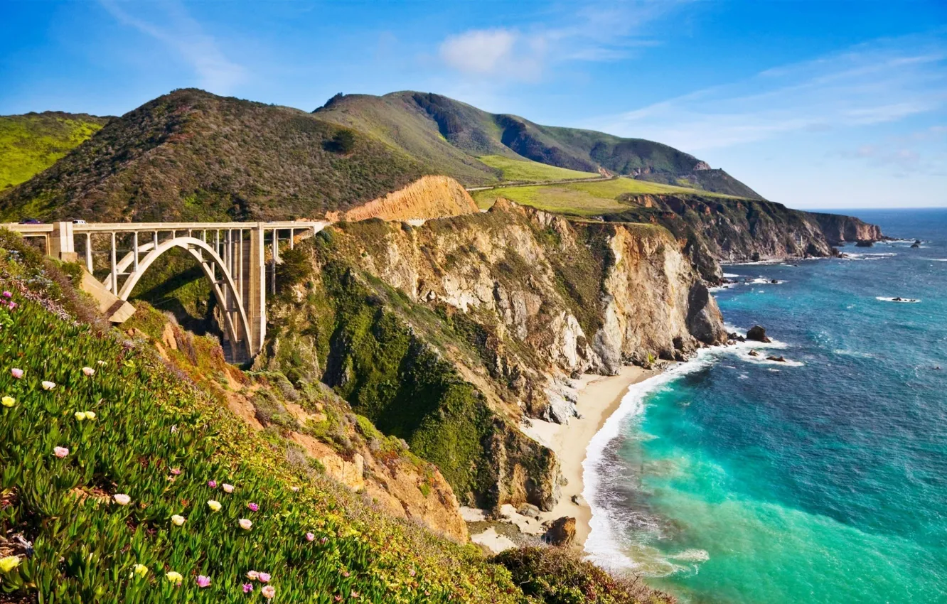 Photo wallpaper road, sea, bridge, rocks, hills