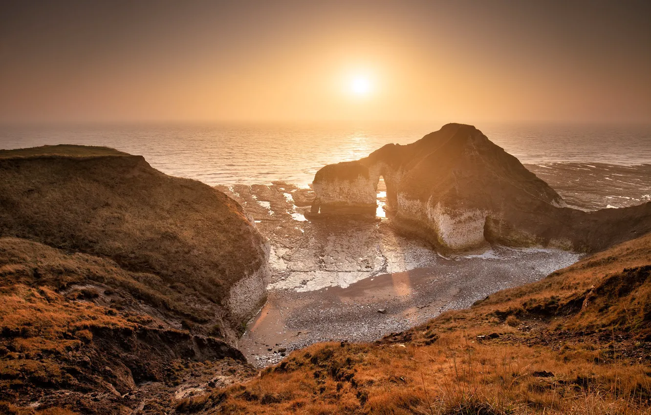 Photo wallpaper sea, autumn, the sky, the sun, light, fog, rocks, shore