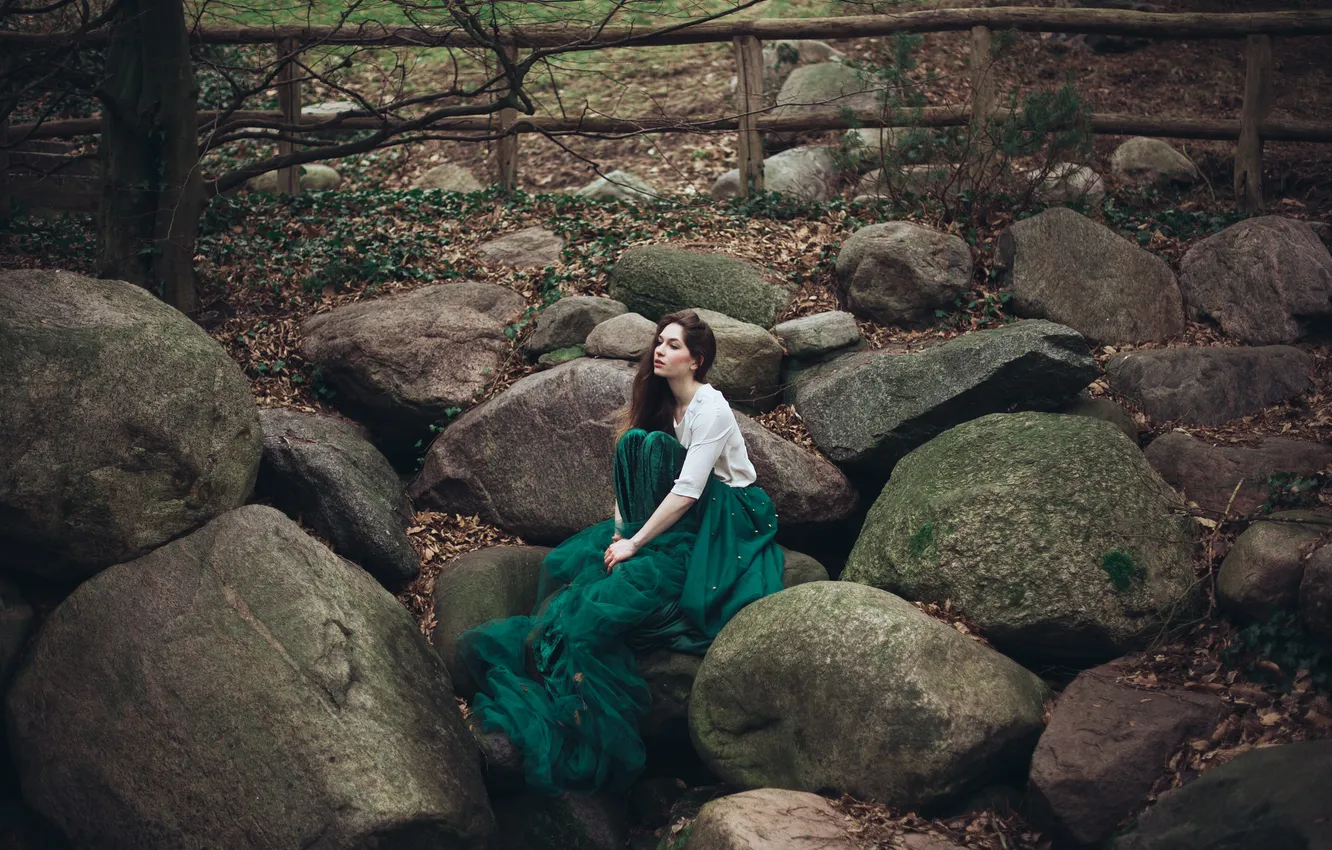 Photo wallpaper girl, pose, stones, dress, sitting