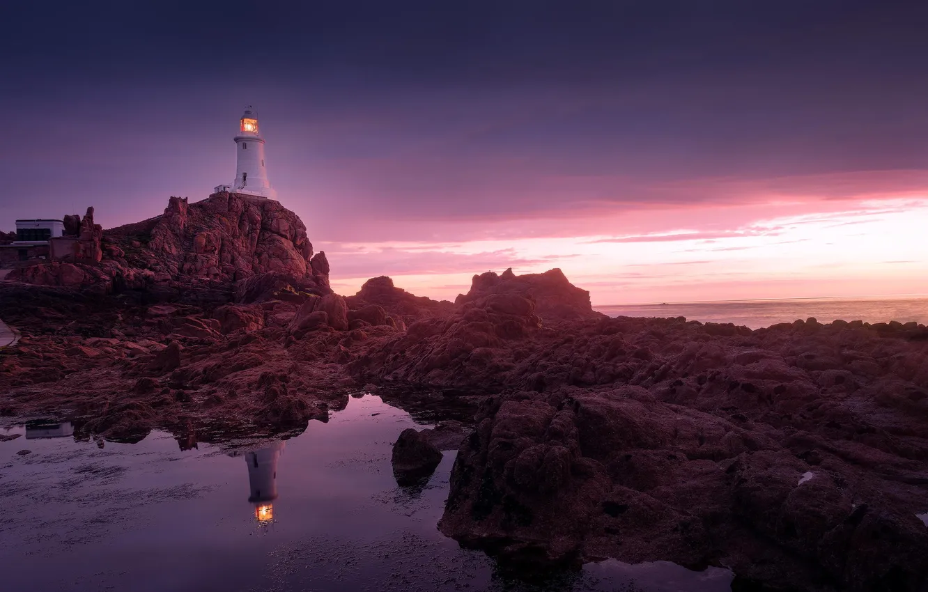 Photo wallpaper the ocean, rocks, dawn, lighthouse, lighthouse, Jersey, Corbiere