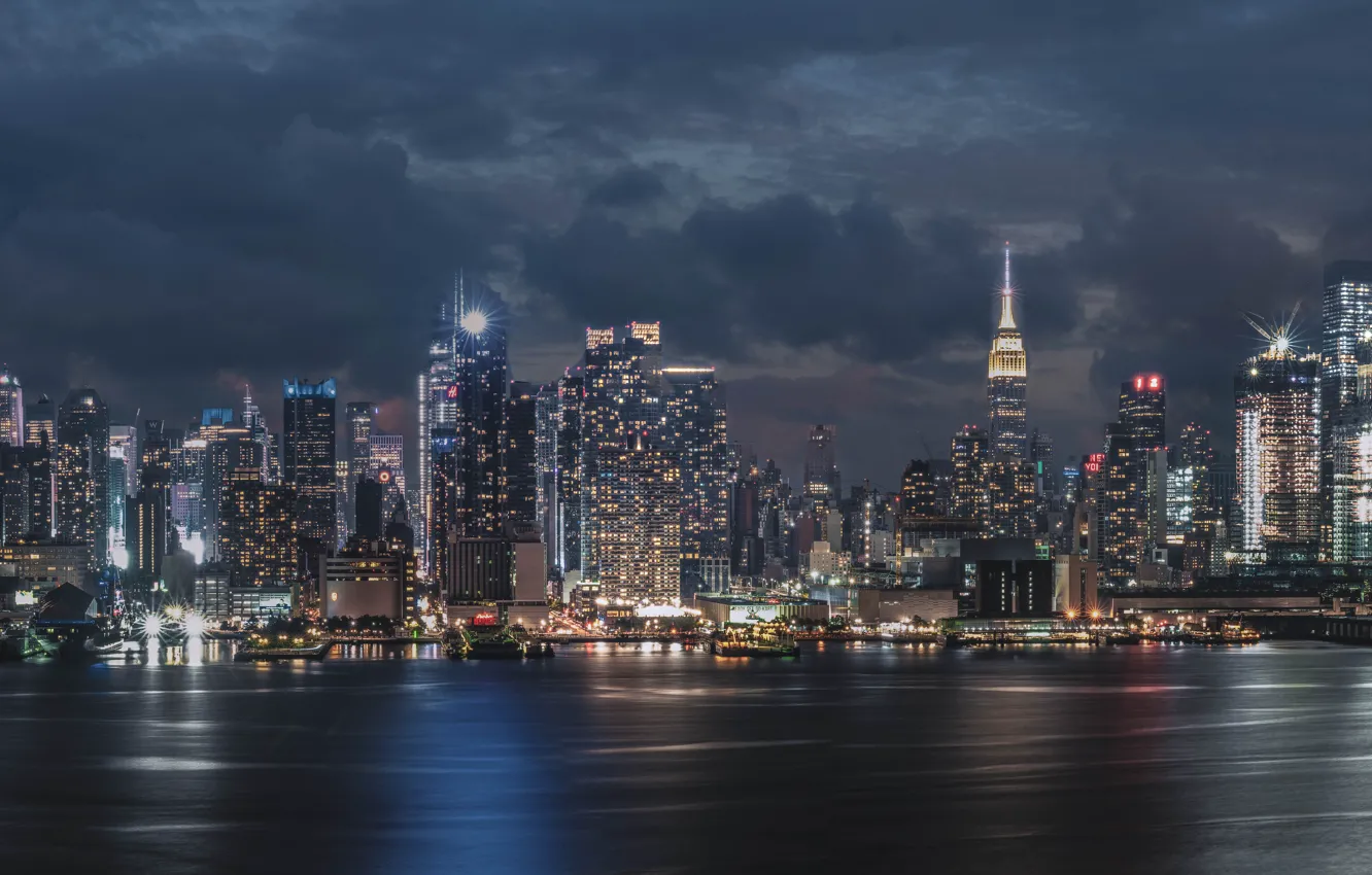 Photo wallpaper the sky, clouds, night, clouds, the city, lights, shore, building