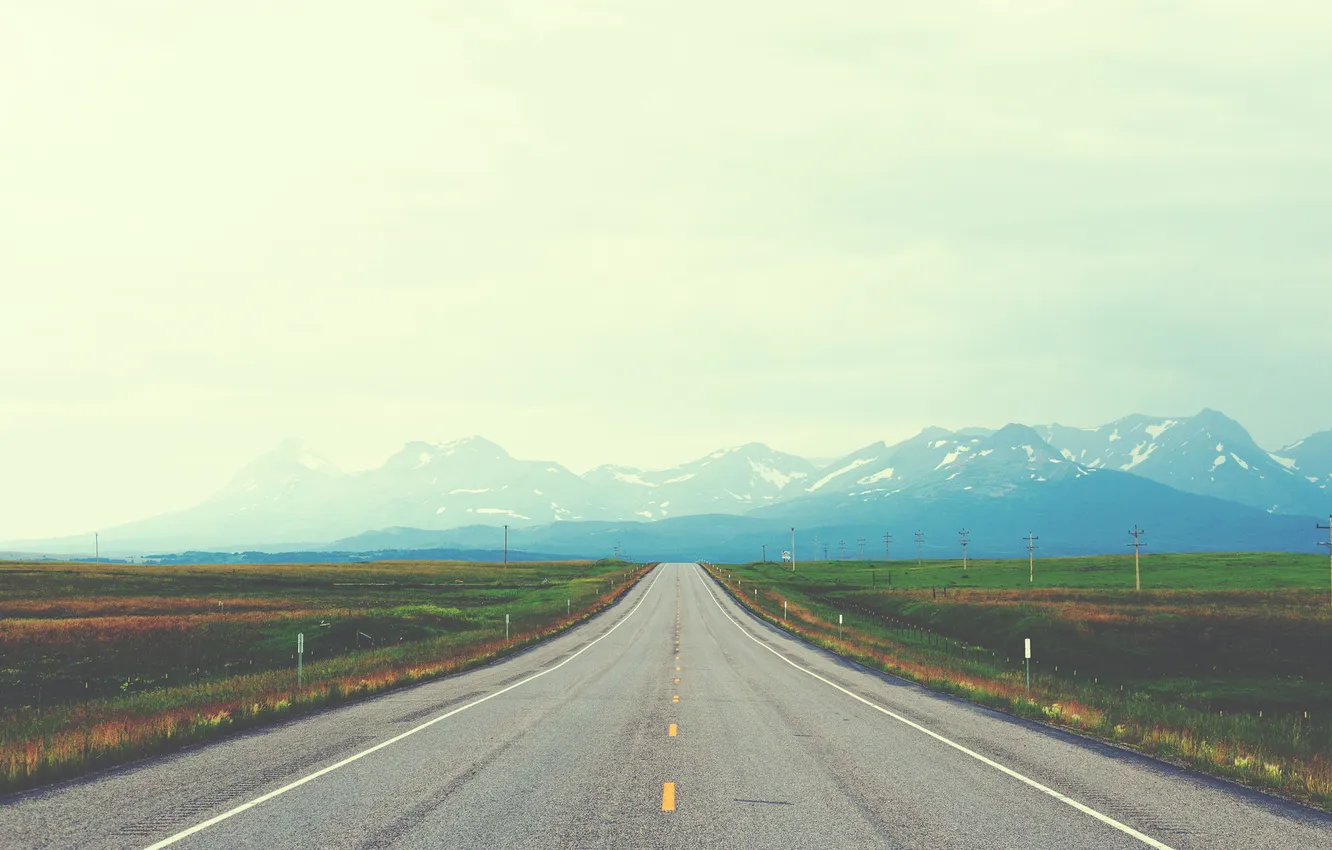 Photo wallpaper road, the sky, grass, mountains, horizon