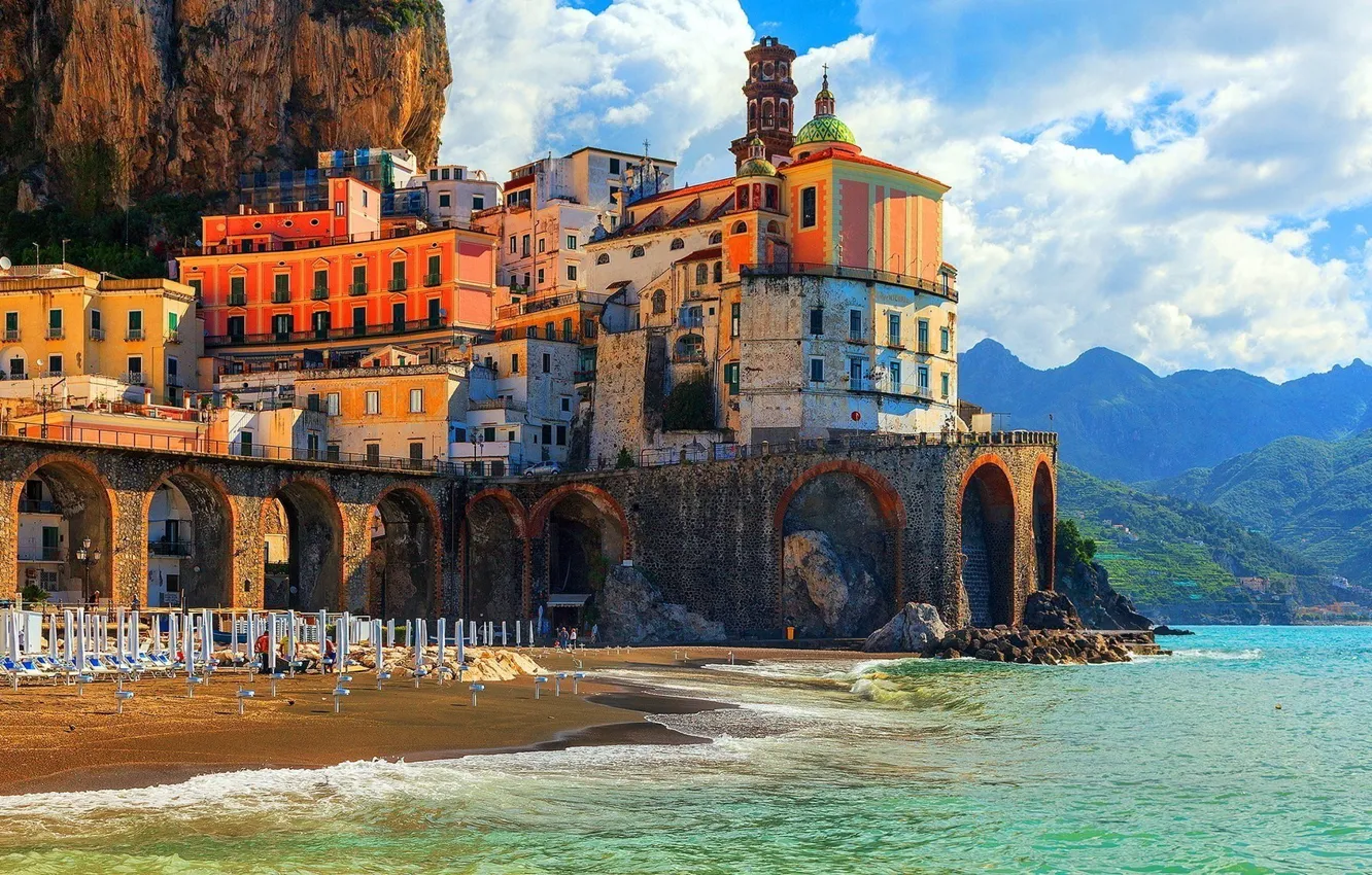 Photo wallpaper city, waves, rock, beach, tower, sky, sea, landscape