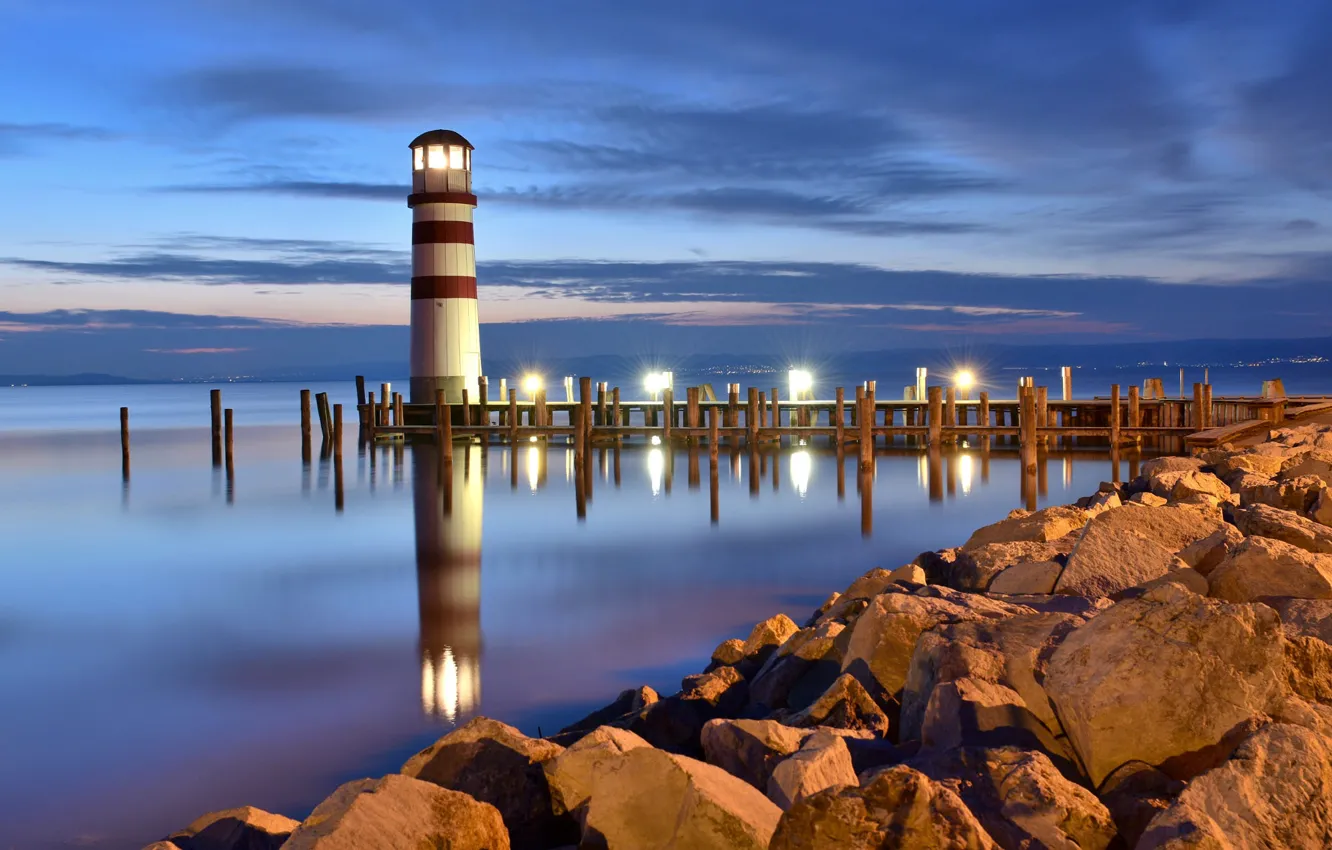 Photo wallpaper rays, light, landscape, lake, stones, shore, lighthouse, the evening