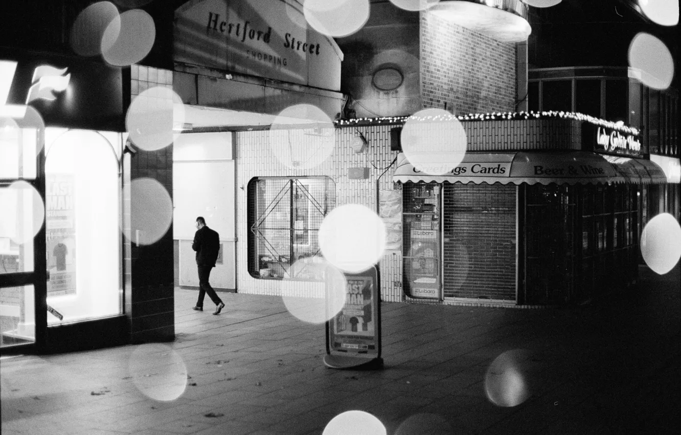 Photo wallpaper light, night, man, shop, globes, urban scene
